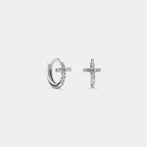 A pair of gold-plated hoop earrings with a small cross design, made of sterling silver and adorned with cubic zirconia.