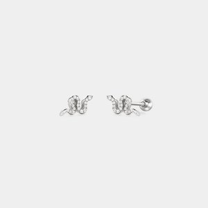 A pair of screw back crawler earrings designed to resemble a snake, with a white gold plating on sterling silver, displayed against a white background.