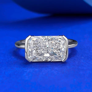 Diamond ring with a blue background