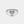 Heart-shaped diamond ring on a light gray background