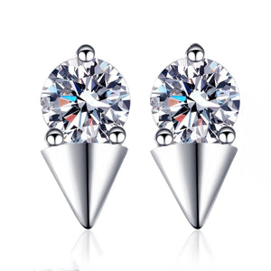 Pair of silver earrings with clear gemstones on a white background