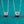 Two silver necklaces with round diamond pendants on a teal background