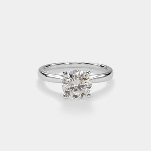 Diamond ring on a light gray background