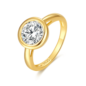 Gold ring with a diamond on a white background