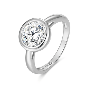 Silver ring with a large diamond on a white background