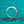 Silver ring on a textured teal background