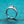 Silver ring with a diamond on a turquoise background