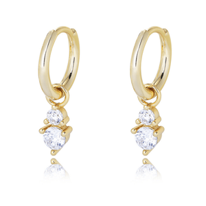 Gold hoop earrings with small round gemstones on a white background