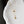 Gold necklace with star pendant on a white textured surface