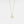 A gold-plated sterling silver necklace with a sun charm pendant on a chain.