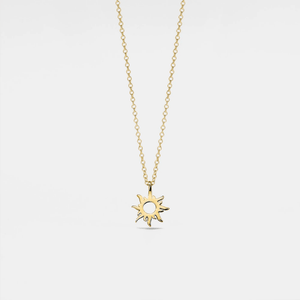 A gold-plated sterling silver necklace with a sun charm pendant on a chain.