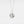Silver necklace with a round locket feature a sun face design on a light gray background