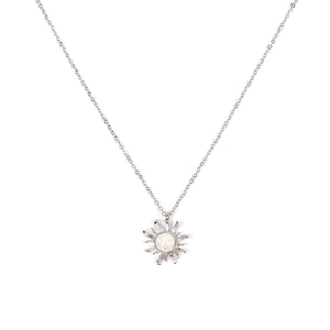 Silver necklace with a sun-shaped pendant on a white background
