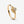 A gold-colored ring featuring a sun motif with rays extending outward, set with small cubic zirconia stones.