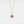 A rose gold-plated sterling silver necklace with a sunflower charm and a central projection stone, displayed on a white background.