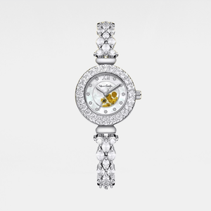 Silver watch with floral design on a white background