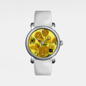 Watch with a floral design on the dial and white strap on a light gray background
