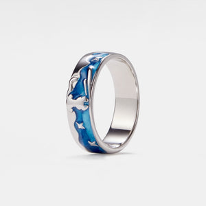 A silver band ring with blue enamel design featuring a fox and a star, inspired by 'The Little Prince'.