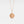 Rose gold plated round locket necklace featuring a “Little Prince” engraved design with a star detail, on a delicate chain against a clean white background.