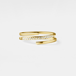 Gold open ring with small diamonds on a light gray background