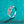 Silver ring with three diamonds on a teal background