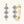 Gold hoop earrings with clear gemstones on a white background