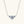 A moissanite charm necklace with a three-stone design, set in a gold-colored mounting, attached to a gold-plated chain.