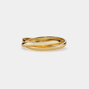 A three-tone trinity interlocking rolling ring with gold and silver colors.