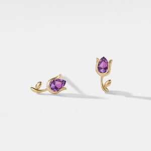 A pair of gold-plated sterling silver stud earrings featuring a tulip design with natural amethyst stones.