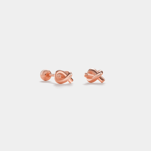 A pair of gold-plated ball end stud earrings with a twisted knot design, displayed against a white background.