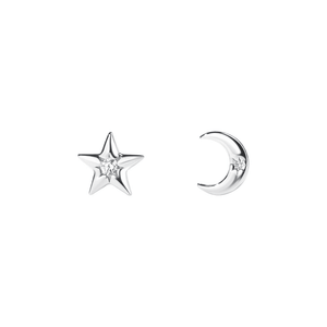 Silver star and moon earrings on a white background