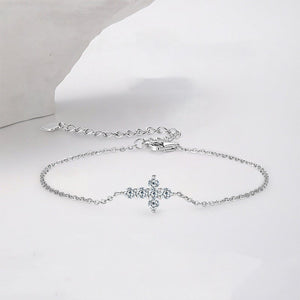 Silver bracelet with a star-shaped clasp on a white background