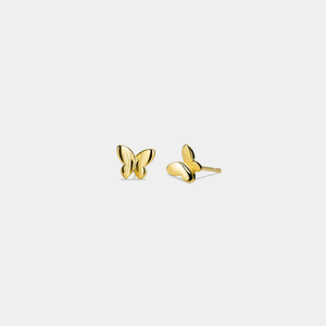 Gold butterfly earrings on a light gray background
