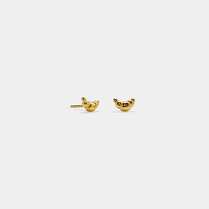 Gold bird-shaped earrings on a white background