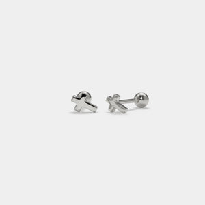 Pair of silver cross-shaped earrings on a white background
