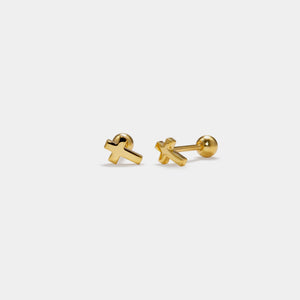 Gold cross-shaped earrings on a white background