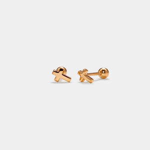 Rose gold cross-shaped earrings on a white background