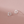 Silver earrings on a pink background