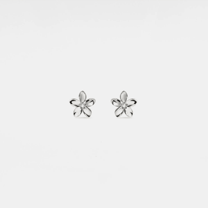 A pair of small gold flower stud earrings with a hypoallergenic finish.