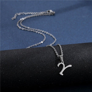Silver necklace with a 'Y' pendant on a black and blue background