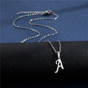 Silver necklace with an 'A' pendant on a black and blue background