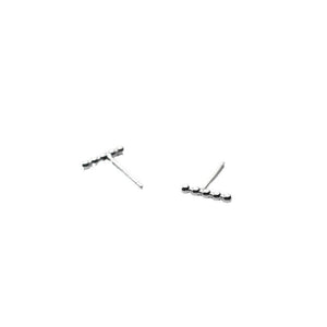 Pair of silver bar earrings on a white background