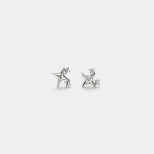 A pair of minimalist star stud earrings in gold plating.