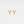 Gold mushroom-shaped earrings on a light beige background
