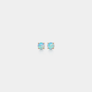 Pair of gold stud earrings with opal stones on a light gray background