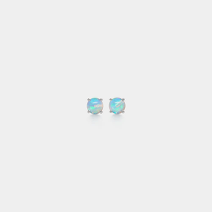 A pair of small round opal stud earrings with gold plating on a white background.