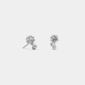 A pair of gold-plated sterling silver stud earrings featuring a pearl with cubic zirconia accents designed to resemble stars.