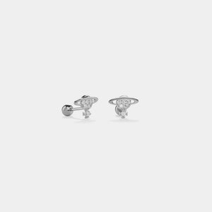 Pair of silver earrings on a light gray background