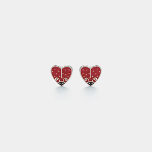 Red heart-shaped earrings with black details on a white background