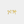 Gold bow-shaped earrings on a light gray background